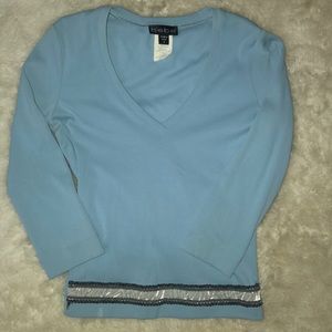 Baby blue v neck  (can be worn dressy or casual )